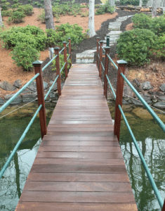 A boat dock with simple railing