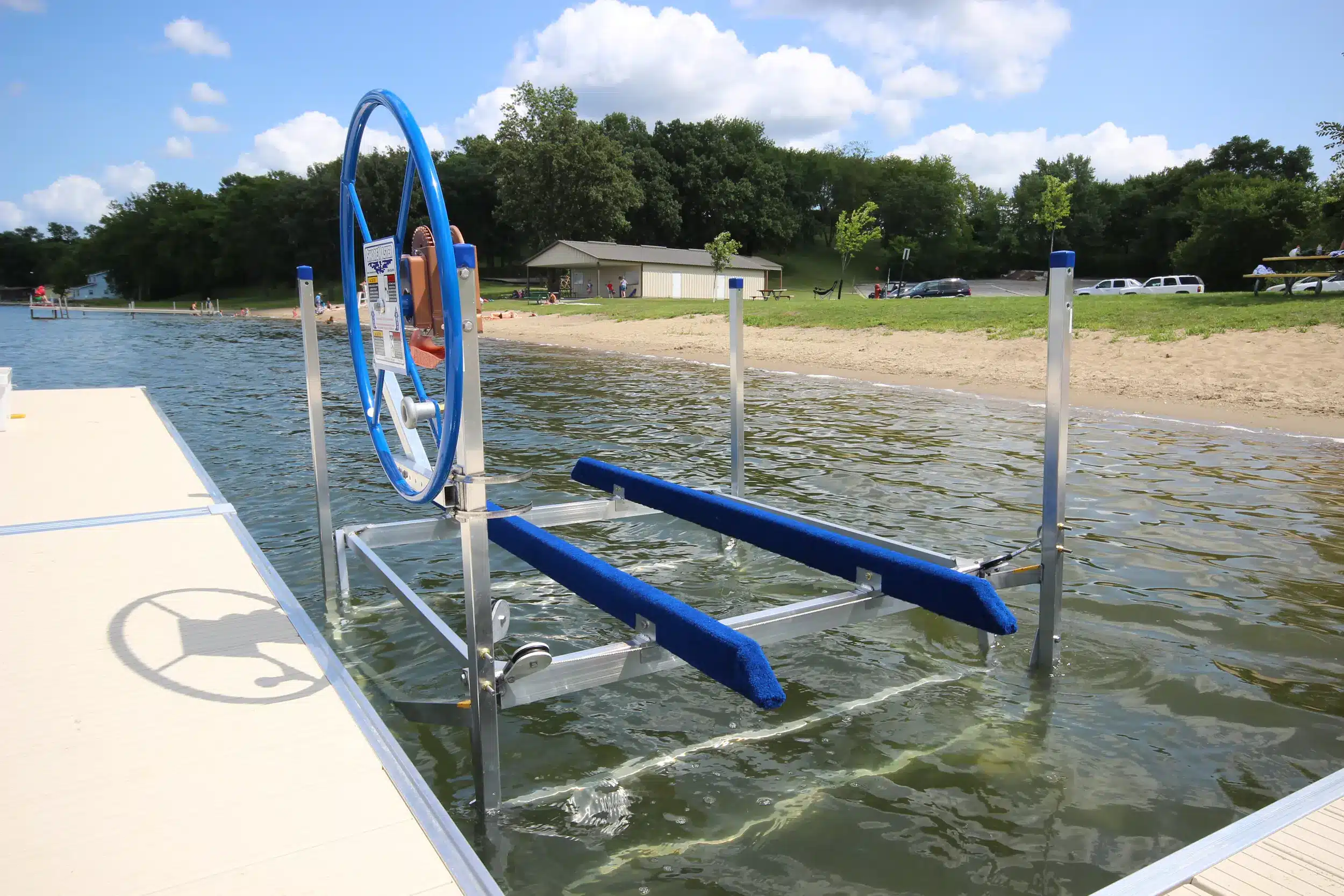 ShoreMaster PWC lift installed in the water beside a dock